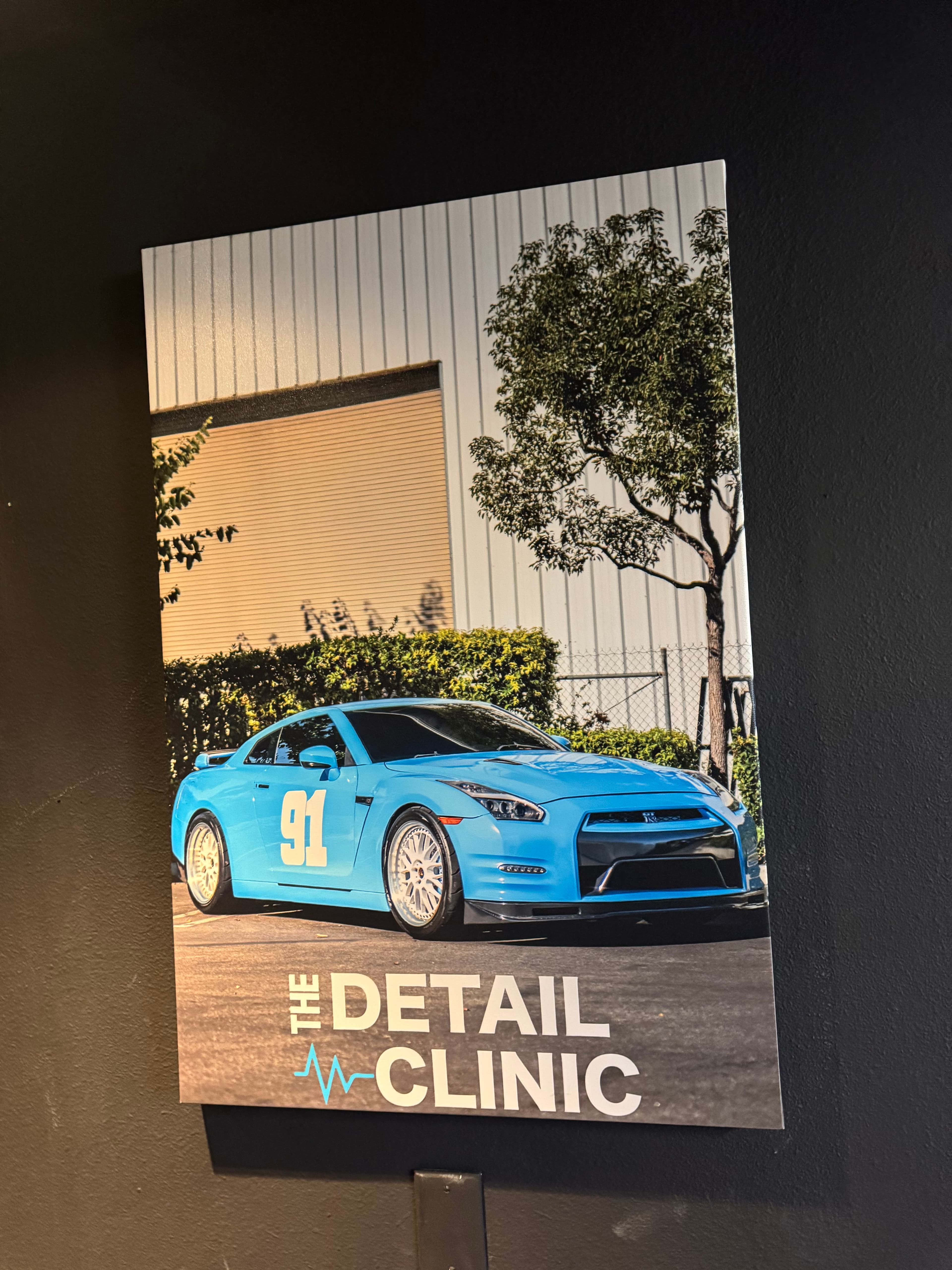 Blue GT-R with The Detail Clinic branding