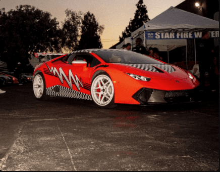Red Lamborghini Huracán with custom wrap